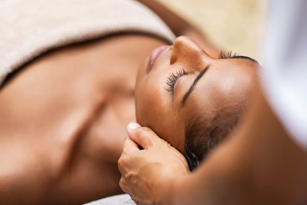 A relaxing spa session featuring a Hydrafacials treatment being administered to a client.