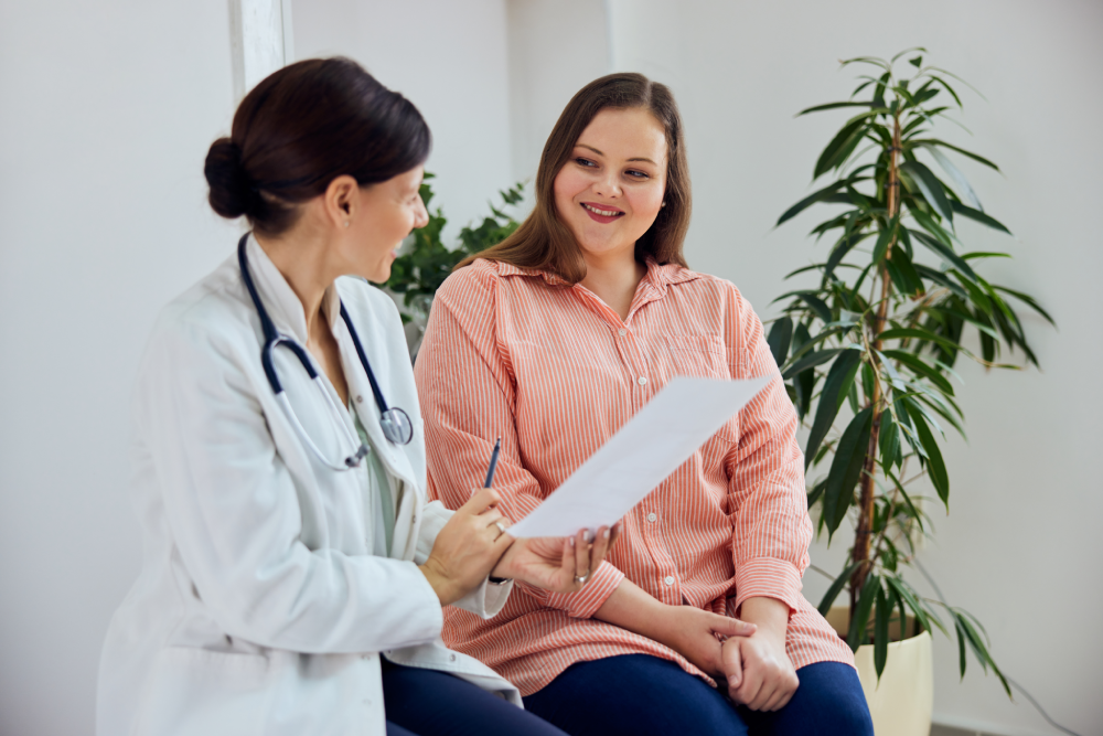 Patient consulting doctor about medical weight loss.