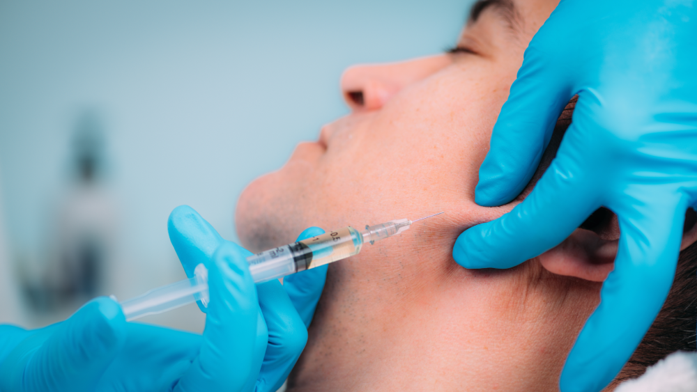 Botox jawline contouring with injectables for men.